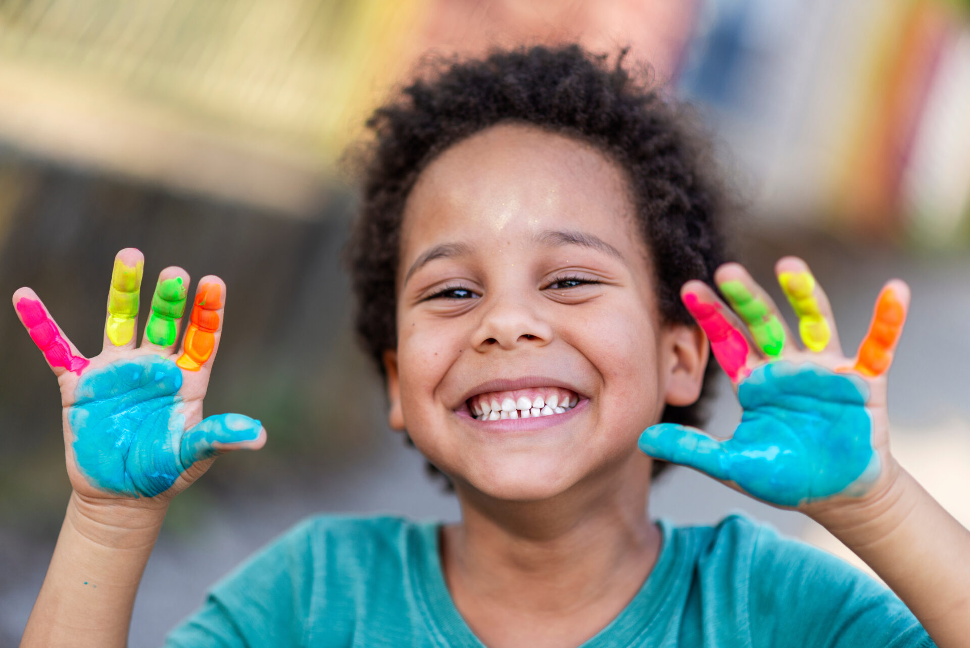 beautiful happy boy with painted hands beautiful happy boy with painted hands